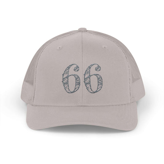 Mesh-back trucker hat with distressed ‘66’ printed on the front panel