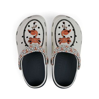 White rubber clogs worn with white-and-black striped socks, each shoe decorated with a round logo depicting a happy orange axolingo and the word ‘AXOLINGO’ repeated around the edge