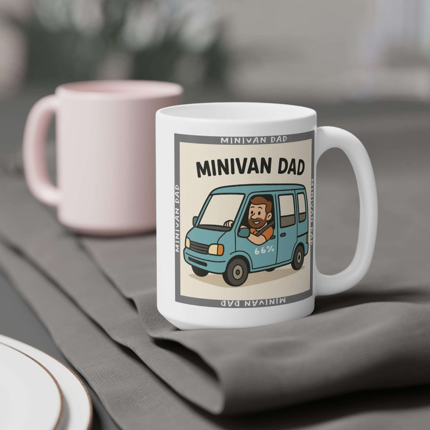 Novelty Minivan Dad coffee mug: white ceramic cup printed with a cheerful father behind the wheel of his minivan and repeating ‘Minivan Dad’ border text.