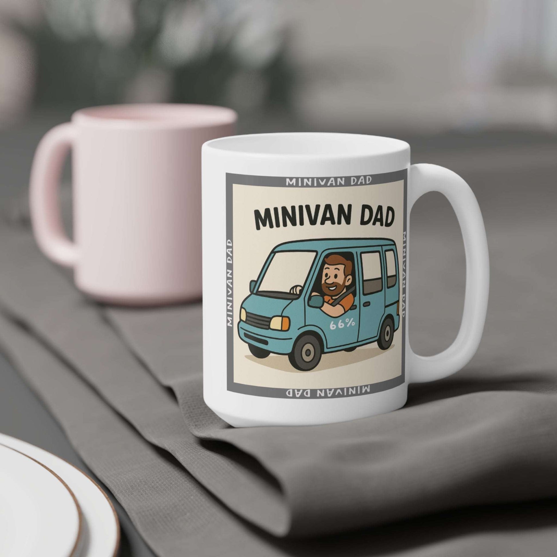 Novelty Minivan Dad coffee mug: white ceramic cup printed with a cheerful father behind the wheel of his minivan and repeating ‘Minivan Dad’ border text.