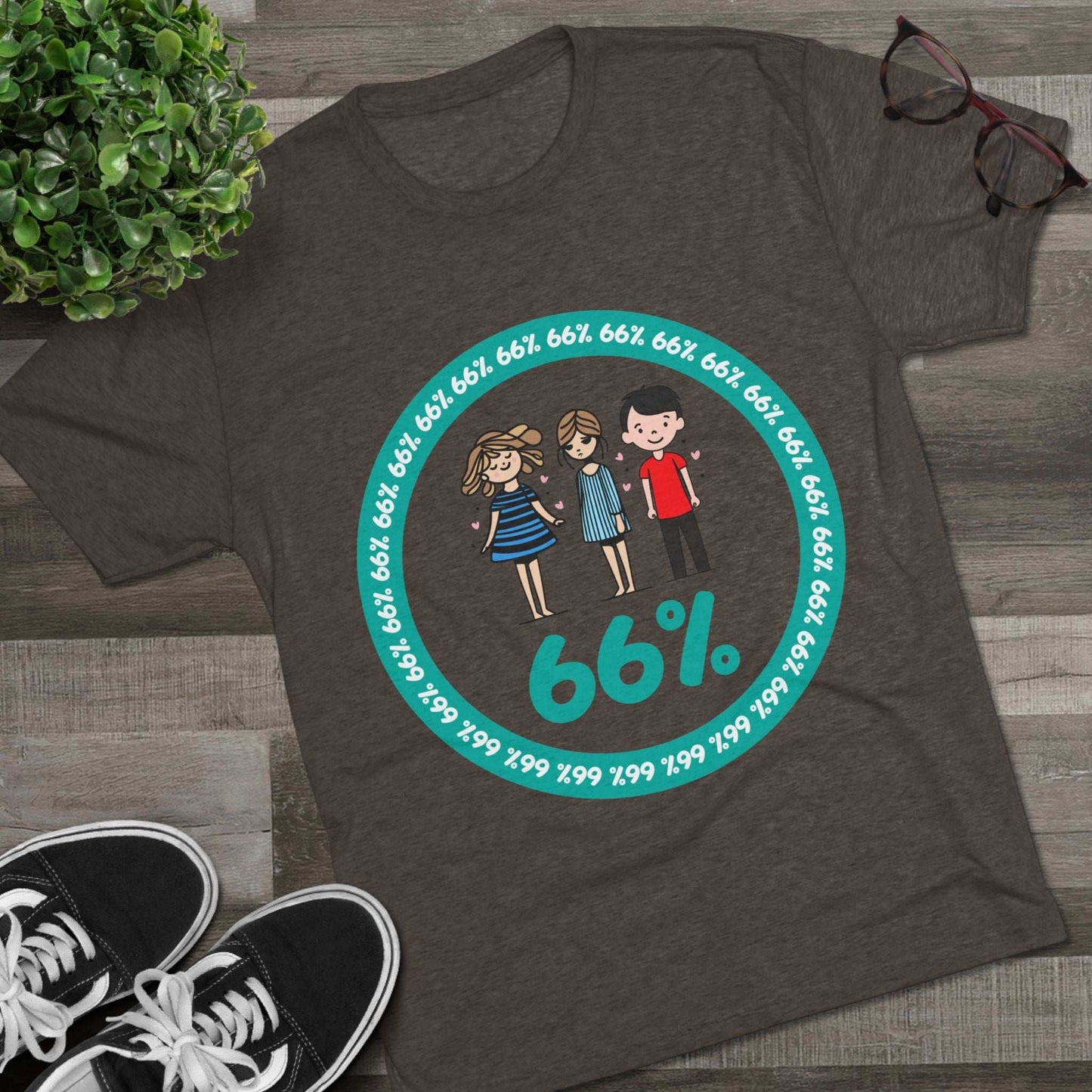 Flat-lay of tri-blend tee with two cartoon girls and one boy inside a teal 66% circle and repeating 66% border