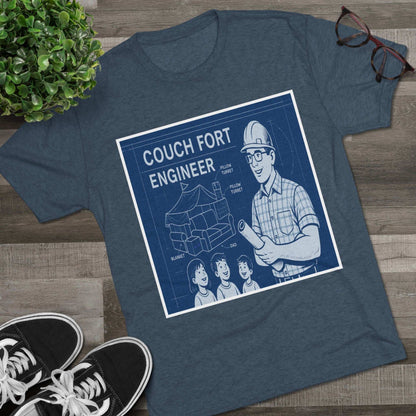 Couch Fort Engineer T-Shirt —Blueprint-style schematic of a couch fort with labeled pillows and blanket, plus a hard-hat dad holding plans.