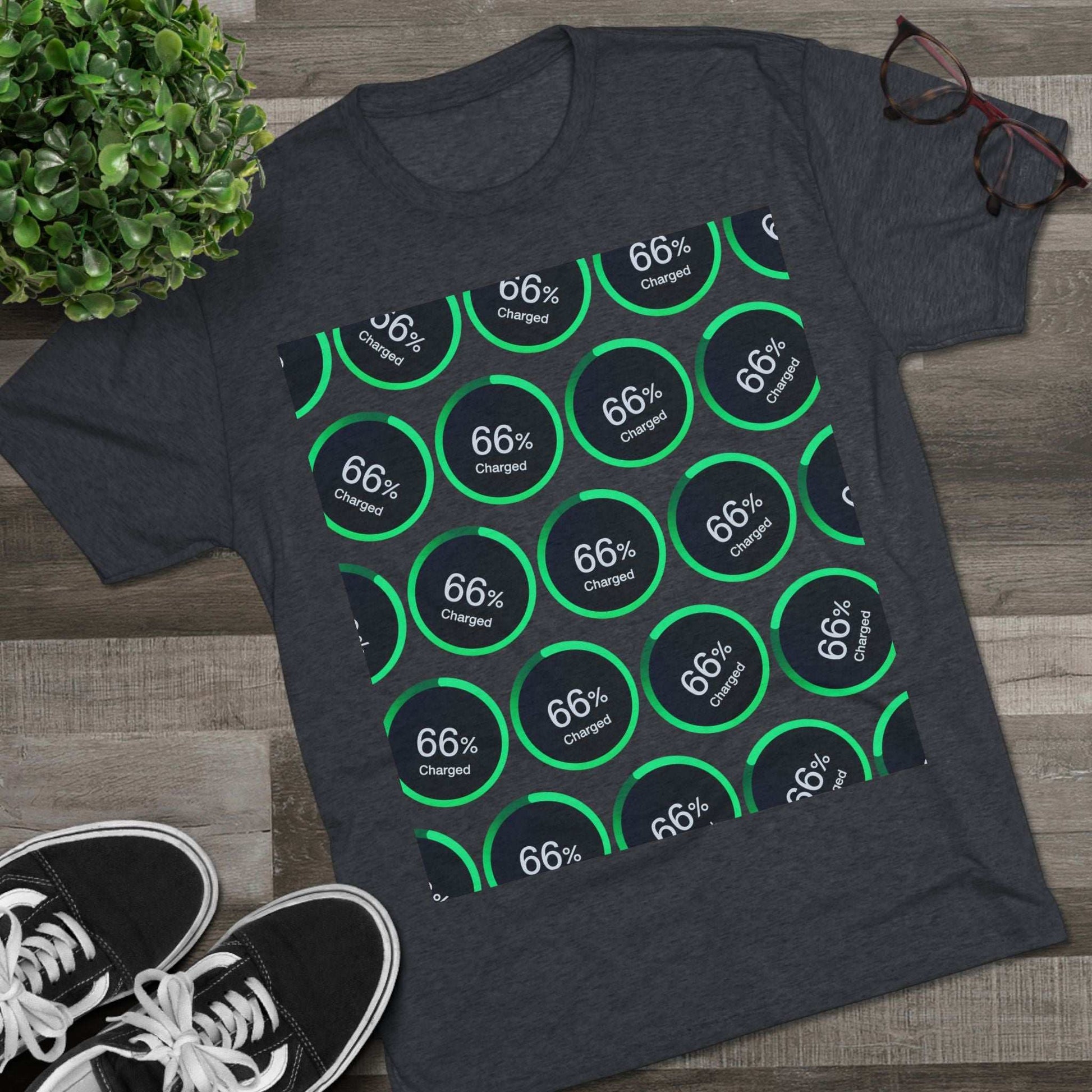 Retro 66% Charged Pattern Tee — tri-blend shirt, flat-lay battery gauge pattern, repeat “66% Charged” graphic, casual unisex style.