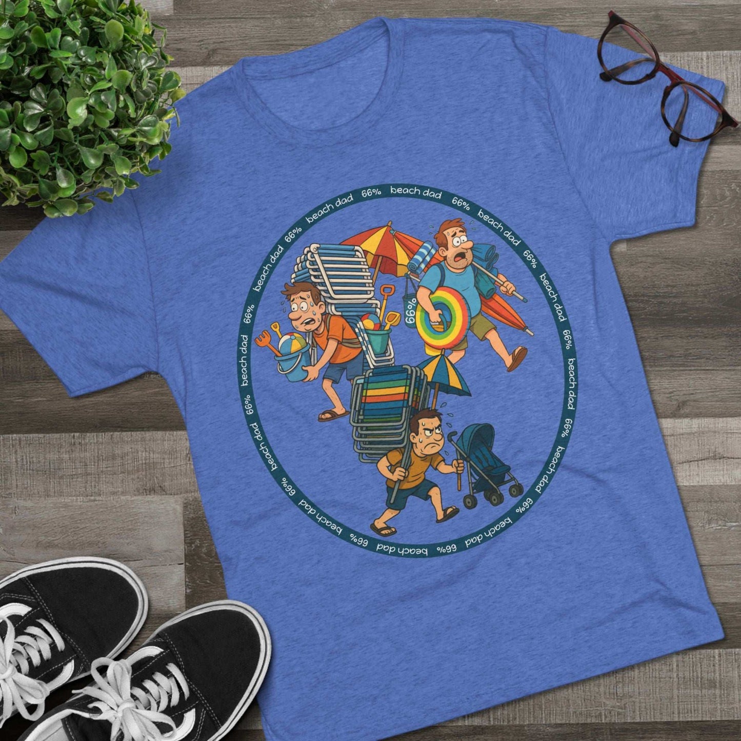Cartoon dad overloaded with beach gear in three chaotic poses, “Beach Dad 66%” design on bright blue tri-blend tee – funny parenting shirt by 66 Percent