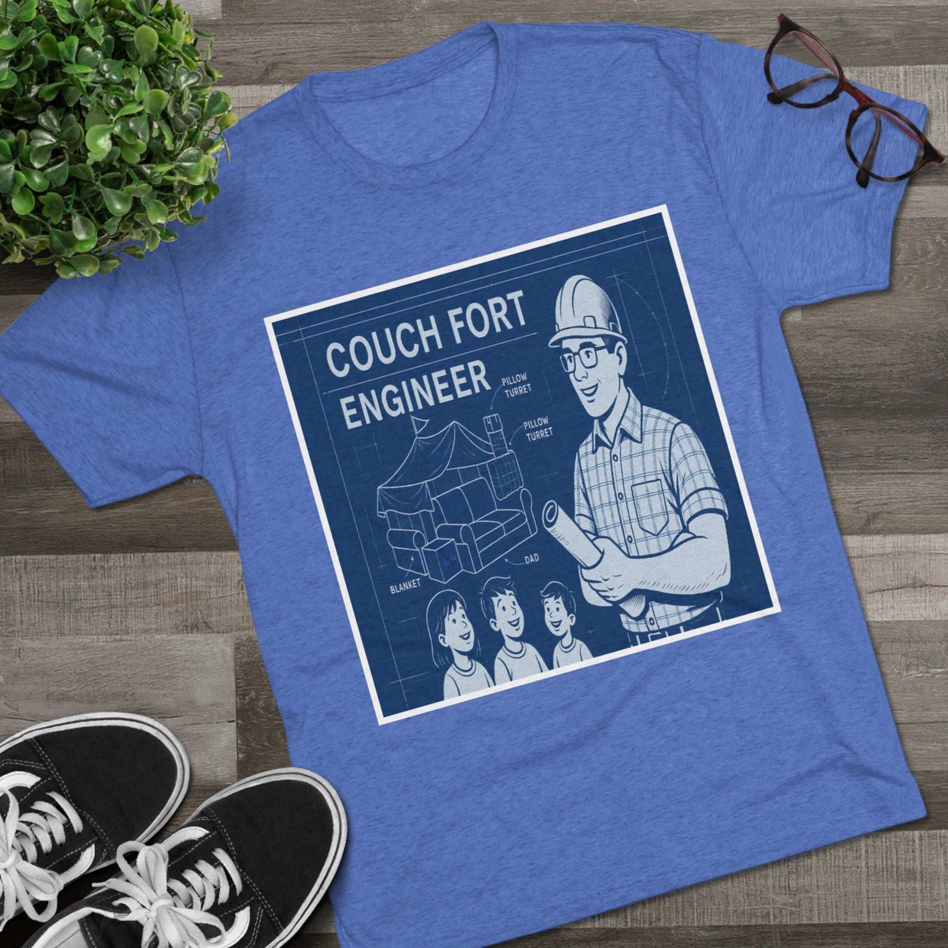 Couch Fort Engineer T-Shirt —Blueprint-style schematic of a couch fort with labeled pillows and blanket, plus a hard-hat dad holding plans.
