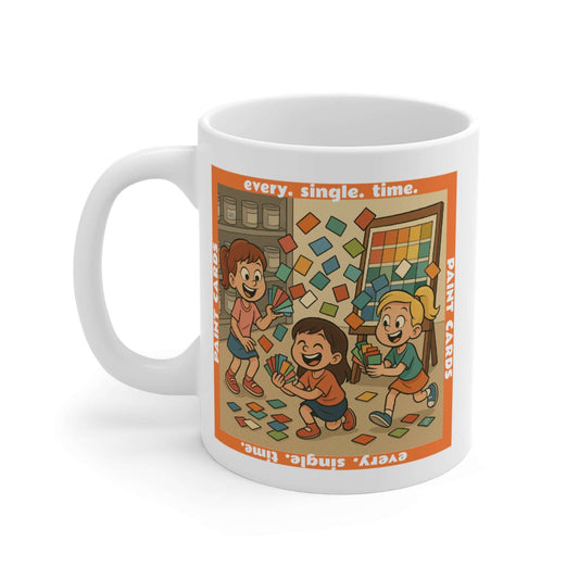 Coffee mug featuring a whimsical illustration of three children holding and tossing colorful paint sample cards in front of a paint shelf, with the text ‘every. single. time.’ and ‘Paint Cards’ framing the scene.