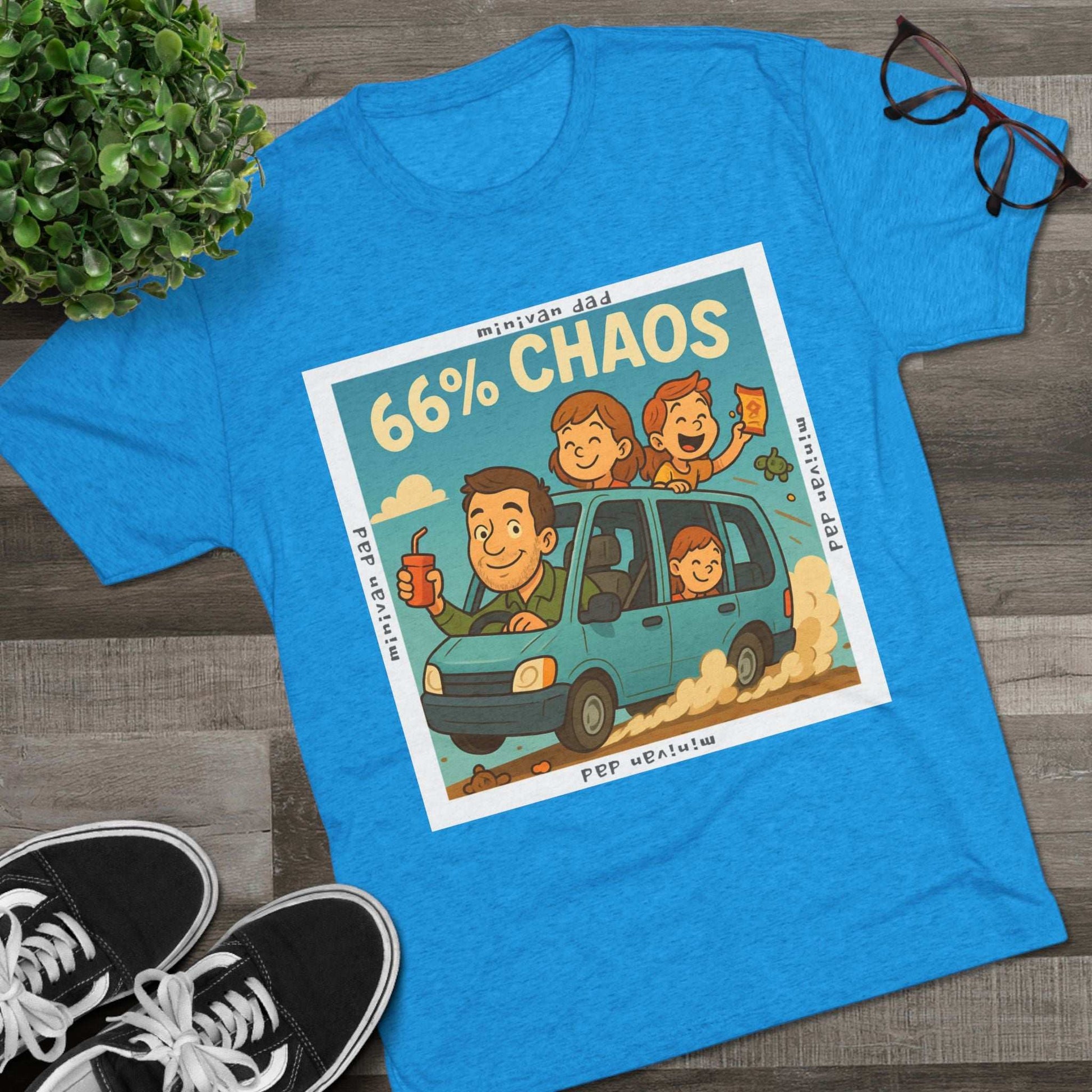 Cartoon dad driving minivan with three excited kids and snacks flying, “66% Chaos” design on dark heather tee – 66 Percent parenting apparel