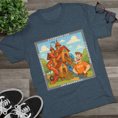 Funny cartoon dad standing proudly beside an enormous playhouse castle with slides, “Overboard Dad 66%” design on bright blue tri-blend t-shirt