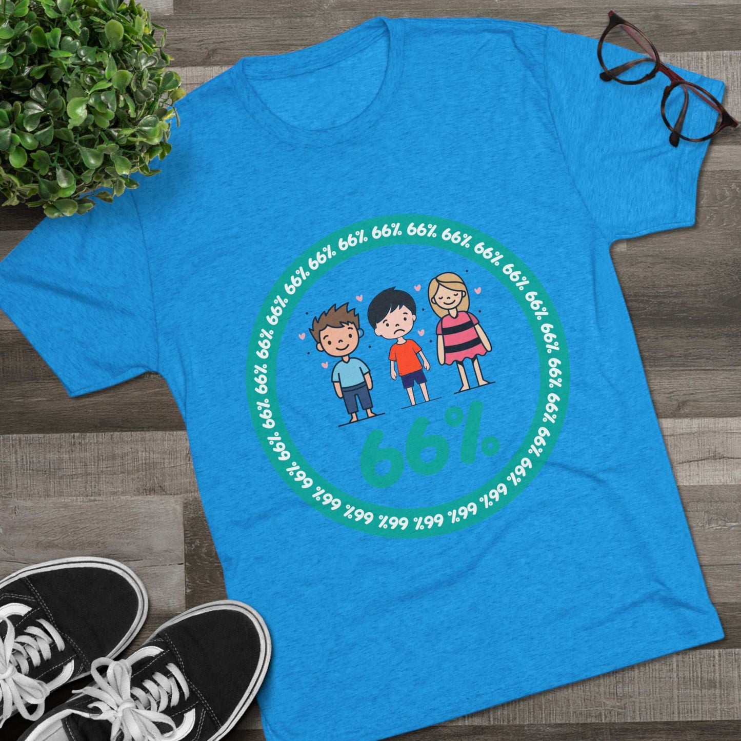 Flat-lay of tri-blend tee with two cartoon boys and one girl inside a teal 66% circle and repeating 66% border