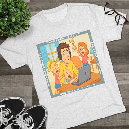 Work From Home Dad 66% Tri-Blend Tee — graphic tee flat-lay, cartoon dad with headphones typing on 66% laptop, three kids demanding attention, green WORK FROM HOME DAD square border, casual unisex style.