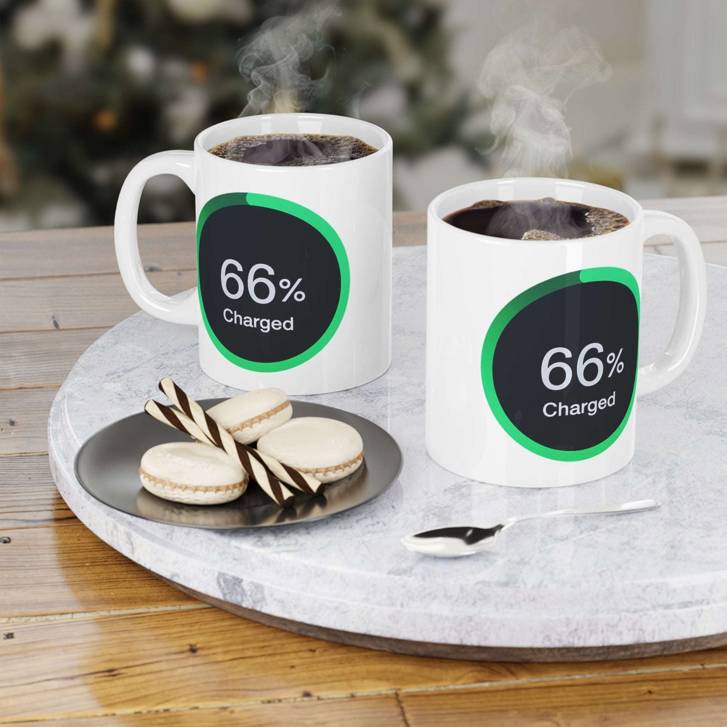 Mug displaying a green-ringed power meter icon reading 66% charged on a black background.