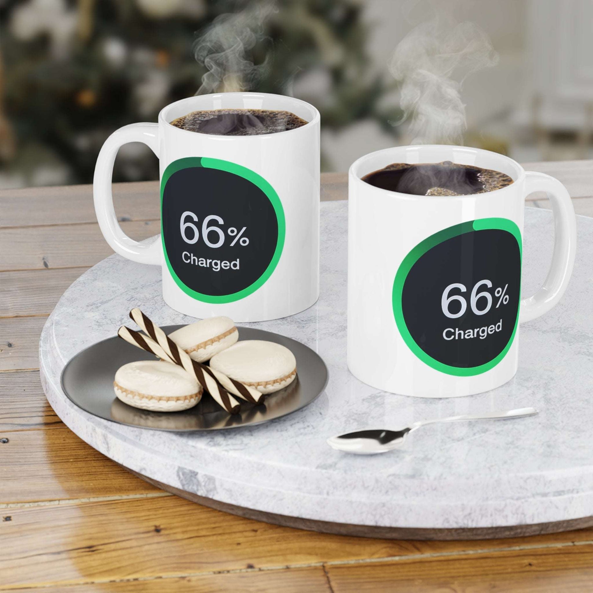 Mug displaying a green-ringed power meter icon reading 66% charged on a black background.