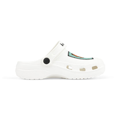 White slip-on clogs decorated with colorful Jibbitz: each shoe has a teal square graphic showing a cute jellyfish with butterfly wings and scattered gold dot accents, plus ‘Bellyfish’ branding on the straps