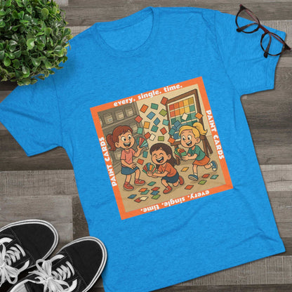 Paint Cards Every Single Time 66% Tri-Blend Tee — graphic t-shirt, flat-lay with cartoon kids and paint swatches, orange bordered square design, casual unisex style