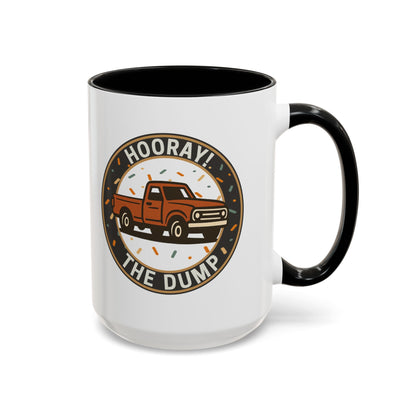 White mug with black interior and handle, featuring a graphic of a truck and text 'Hooray! The Dump' on a white background.