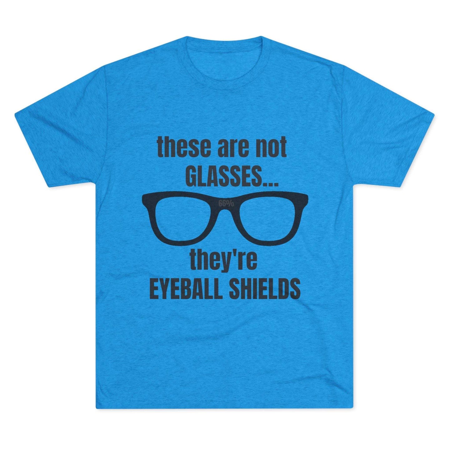 Light heather tri-blend tee flat-laid, printed with black glasses graphic and text ‘these are not GLASSES... they’re EYEBALL SHIELDS.