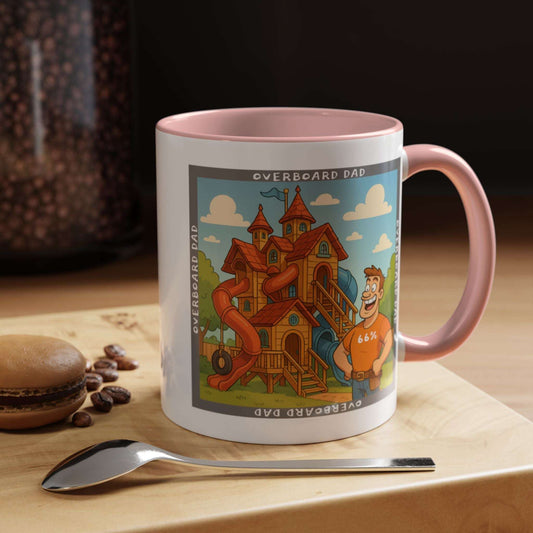 White ceramic mug printed with a cartoon dad wearing a ‘66%’ shirt standing beside a multi-level wooden playhouse with twisting slides, framed by the text ‘OVERBOARD DAD’.