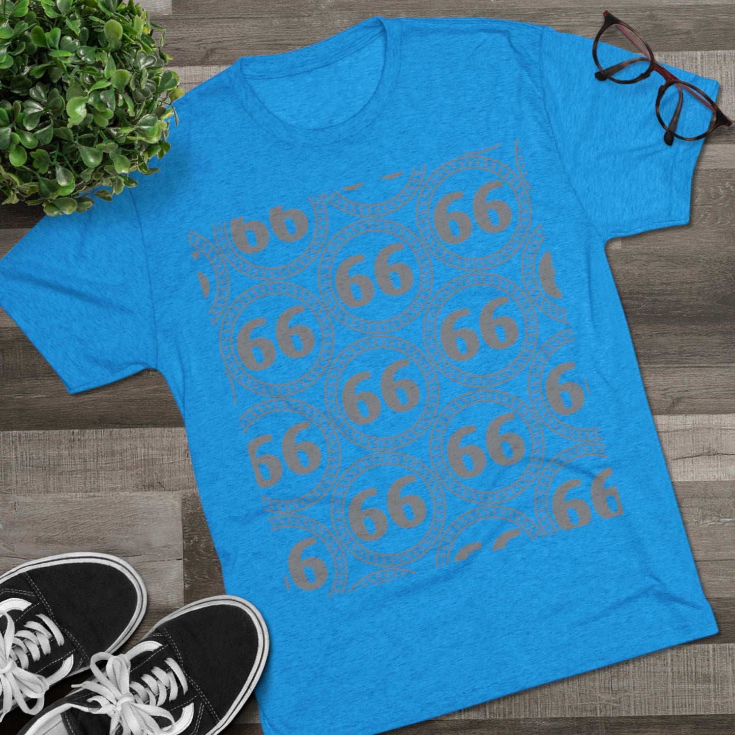 Retro 66% Pattern Tee— tri-blend graphic t-shirt flat-lay, repeating 66 circle pattern, casual vintage style.