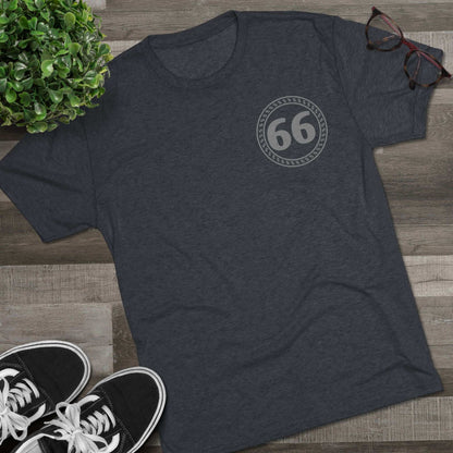 Retro 66% Tri-Blend Tee — graphic t-shirt, flat lay with 66 logo, styled with sneakers, glasses, and plant backdrop