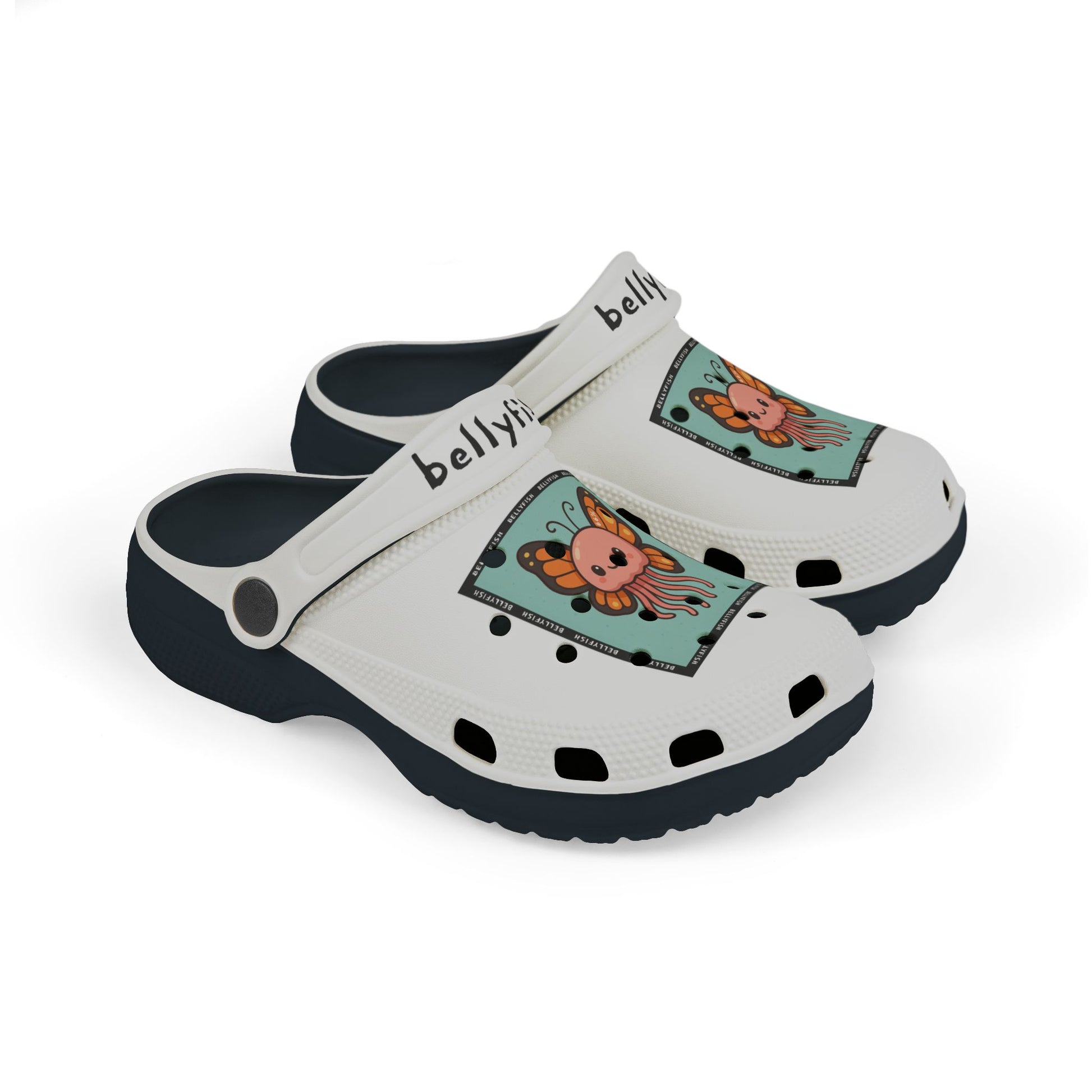 White slip-on clogs decorated with colorful Jibbitz: each shoe has a teal square graphic showing a cute jellyfish with butterfly wings and scattered gold dot accents, plus ‘Bellyfish’ branding on the straps