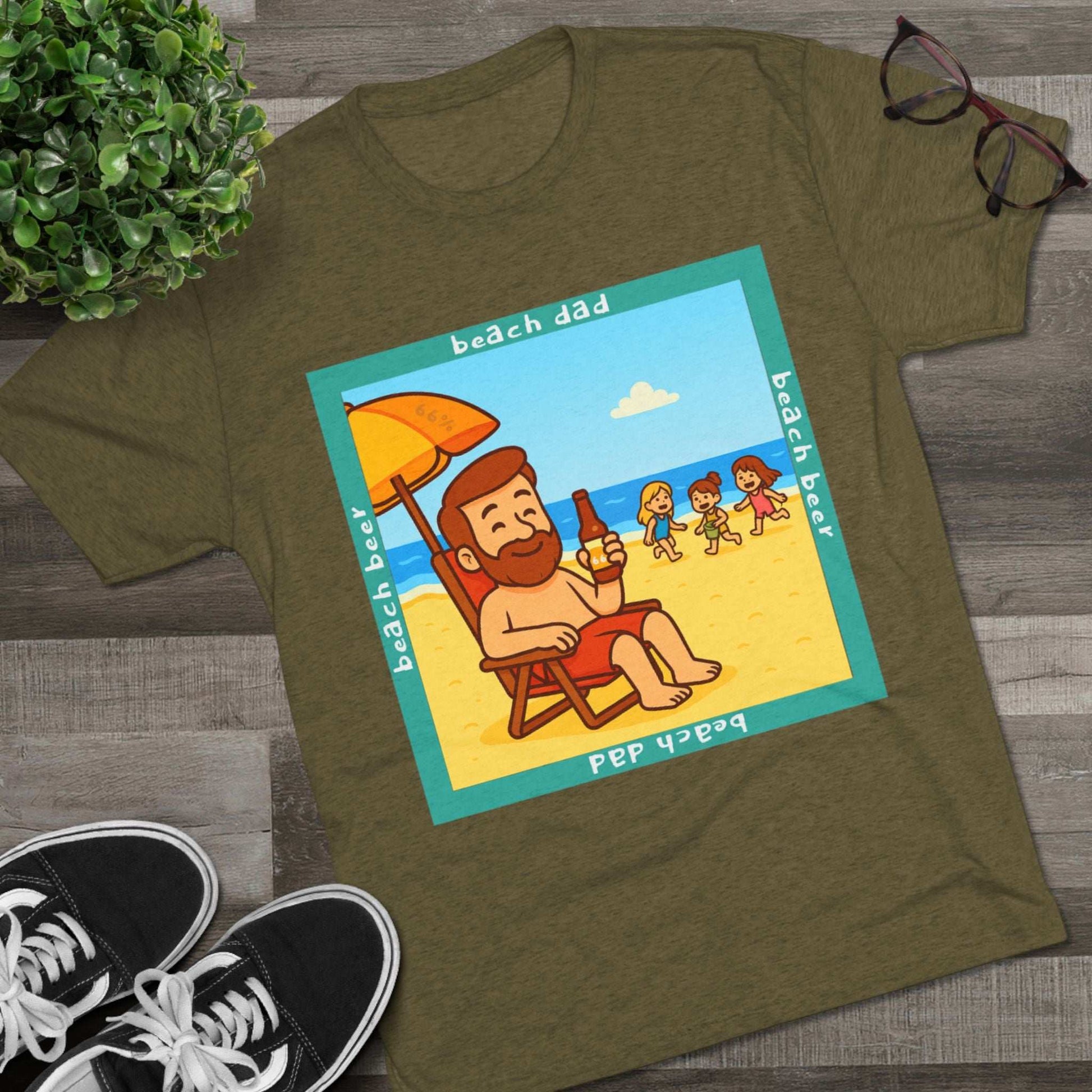 Beach Dad drinking beer on the sand with kids playing – 66% Tri-Blend Tee