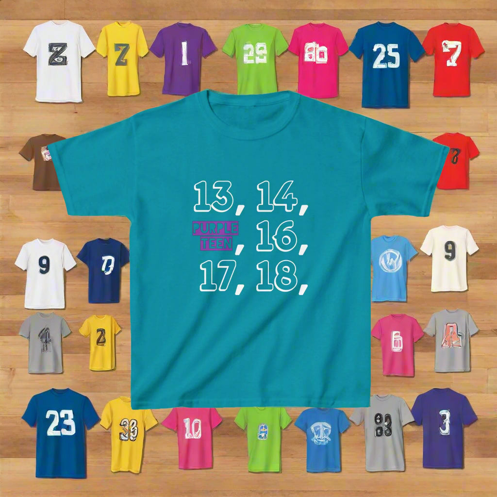 Collection of colorful t-shirts with various designs and numbers on a wooden background