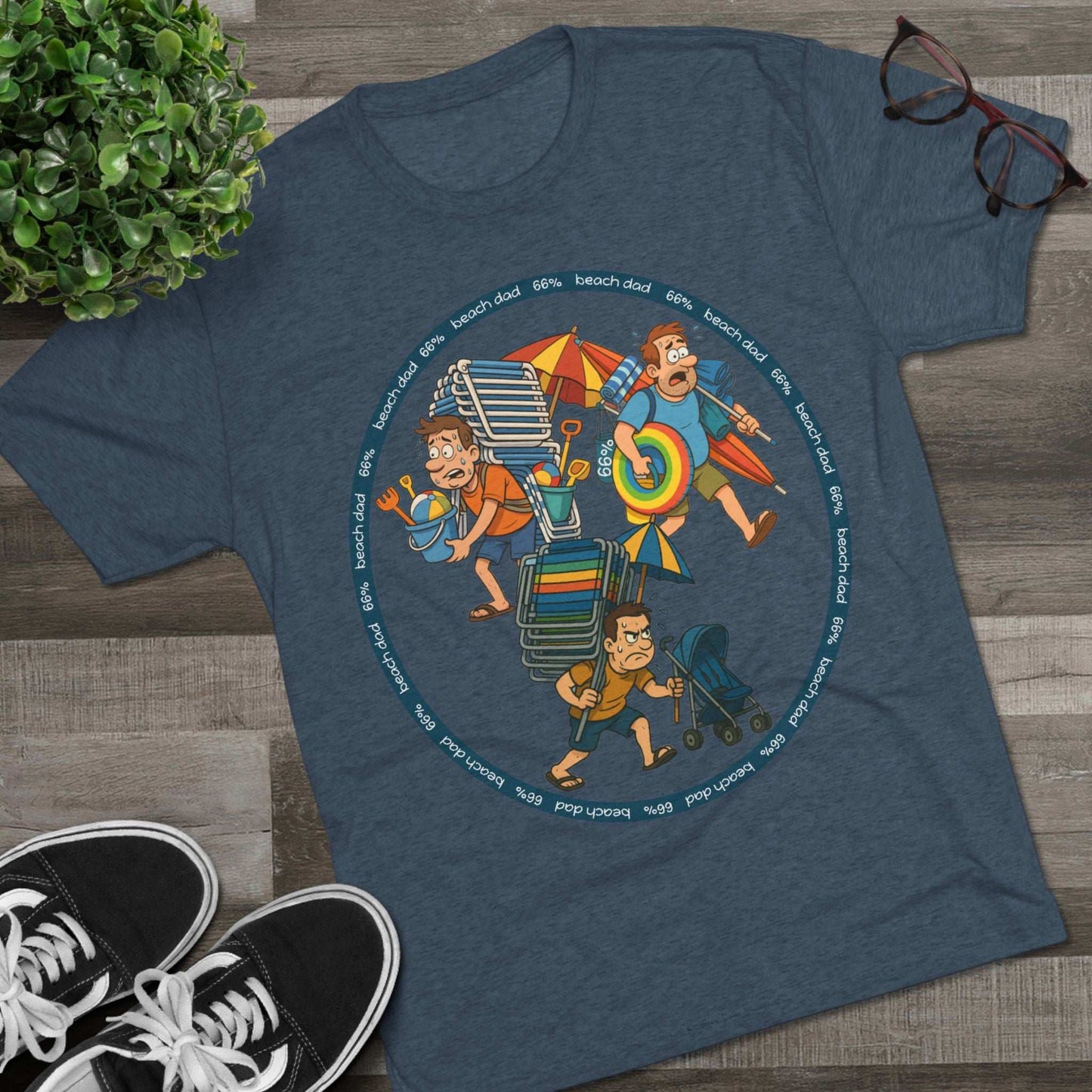 Cartoon dad overloaded with beach gear in three chaotic poses, “Beach Dad 66%” design on bright blue tri-blend tee – funny parenting shirt by 66 Percent