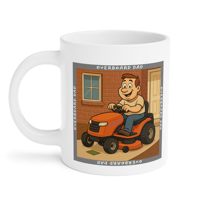 Graphic mug depicting a happy dad mowing the lawn on a ride-on tractor beside a brick wall and front door, encircled by the phrase ‘Overboard Dad’ in a repeating border.