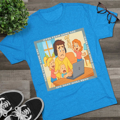 Work From Home Dad 66% Tri-Blend Tee — graphic tee flat-lay, cartoon dad with headphones typing on 66% laptop, three kids demanding attention, green WORK FROM HOME DAD square border, casual unisex style.