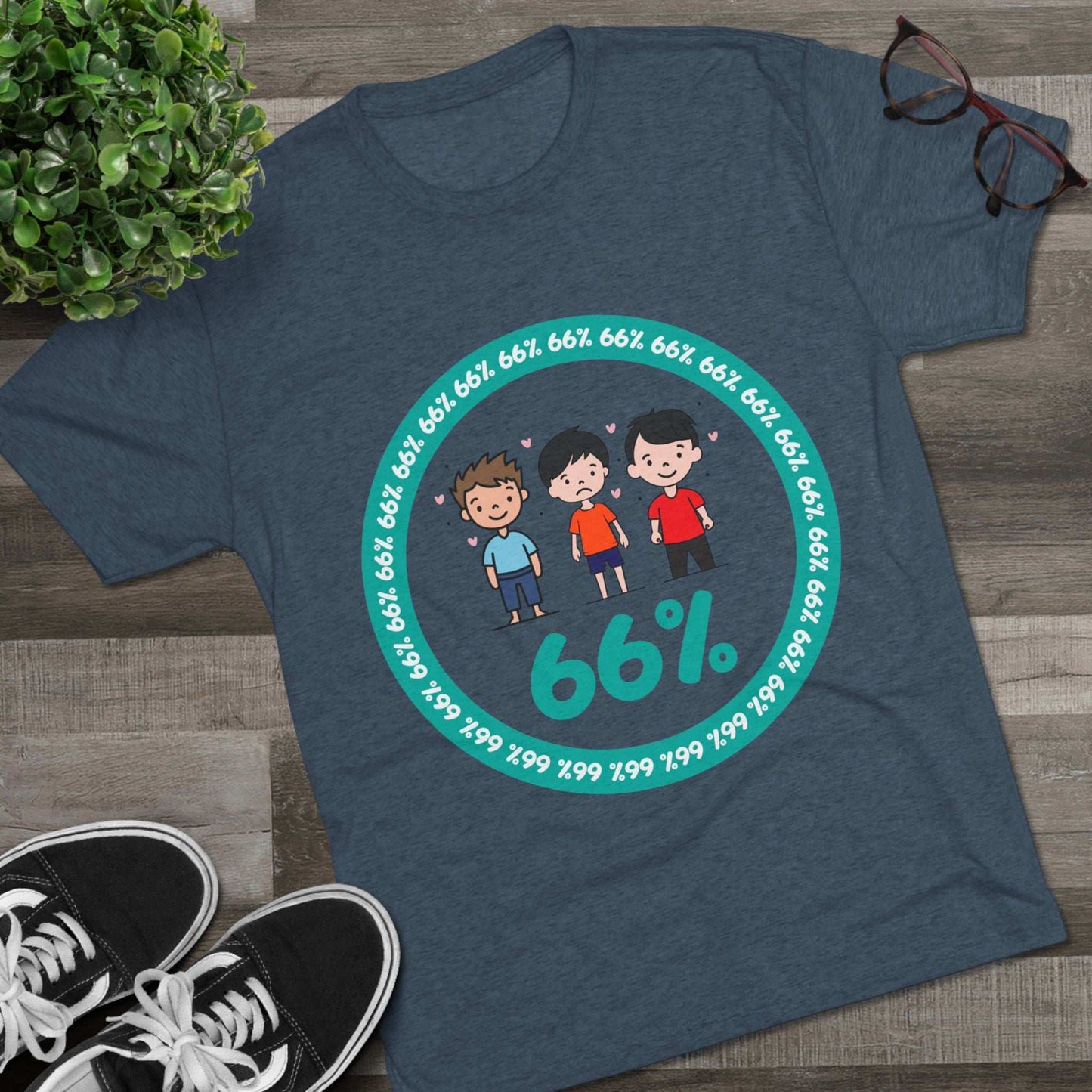 Flat-lay of tri-blend tee with three cartoon boys inside a teal 66% circle and repeating 66% border