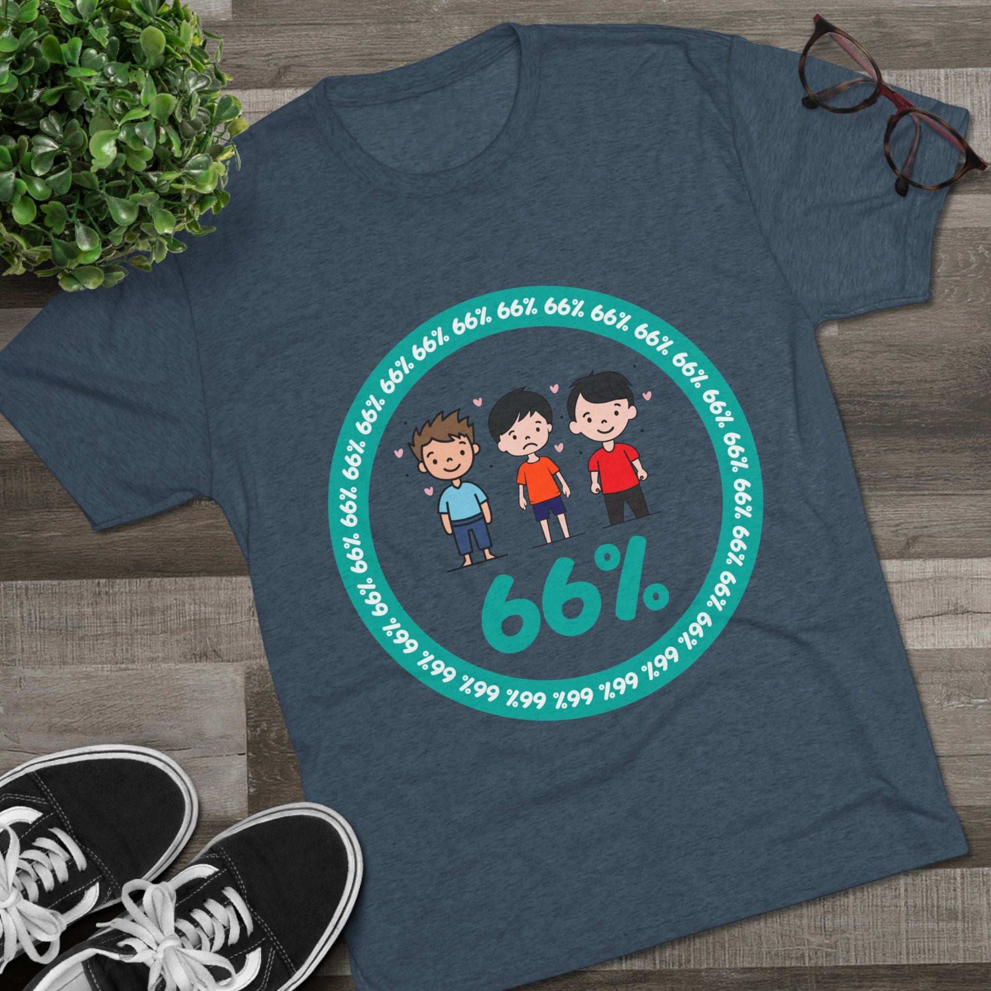 Flat-lay of tri-blend tee with three cartoon boys inside a teal 66% circle and repeating 66% border