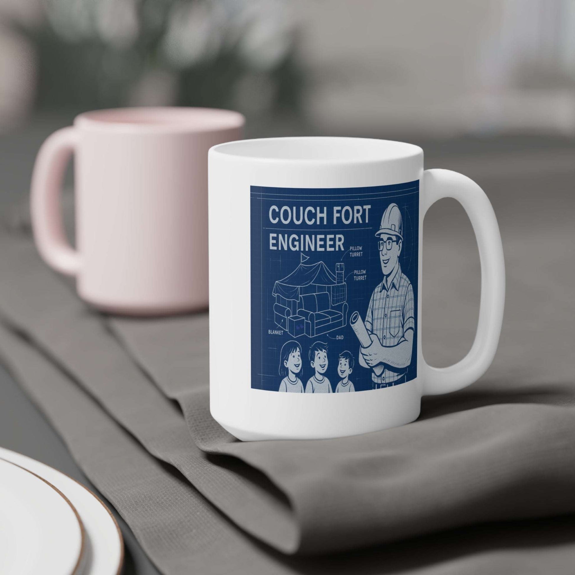 Blueprint-themed mug design reading ‘Couch Fort Engineer,’ depicting a dad wearing safety glasses and hardhat holding a plan, alongside a cutaway diagram of a living-room couch fort and three happy kids.