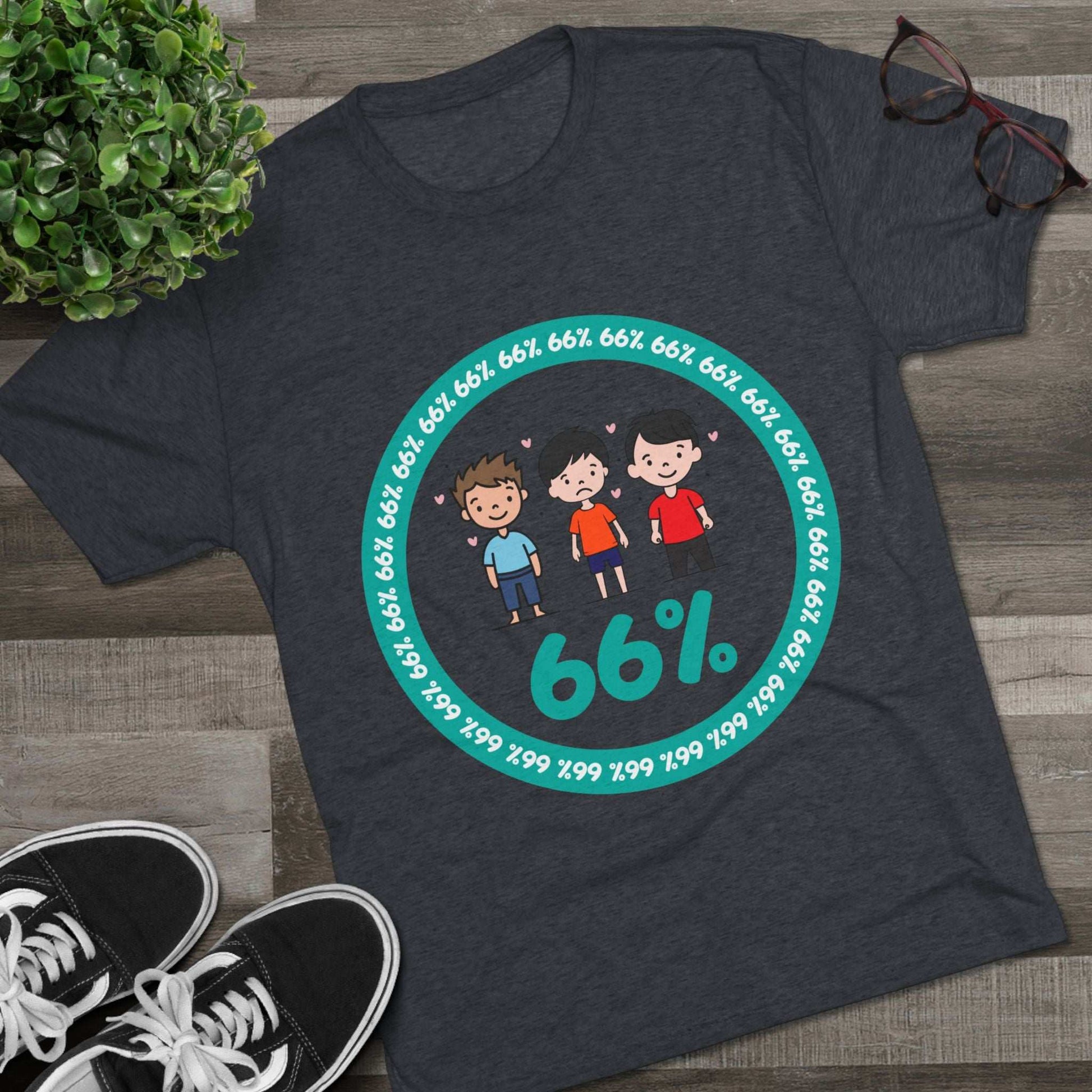 Flat-lay of tri-blend tee with three cartoon boys inside a teal 66% circle and repeating 66% border