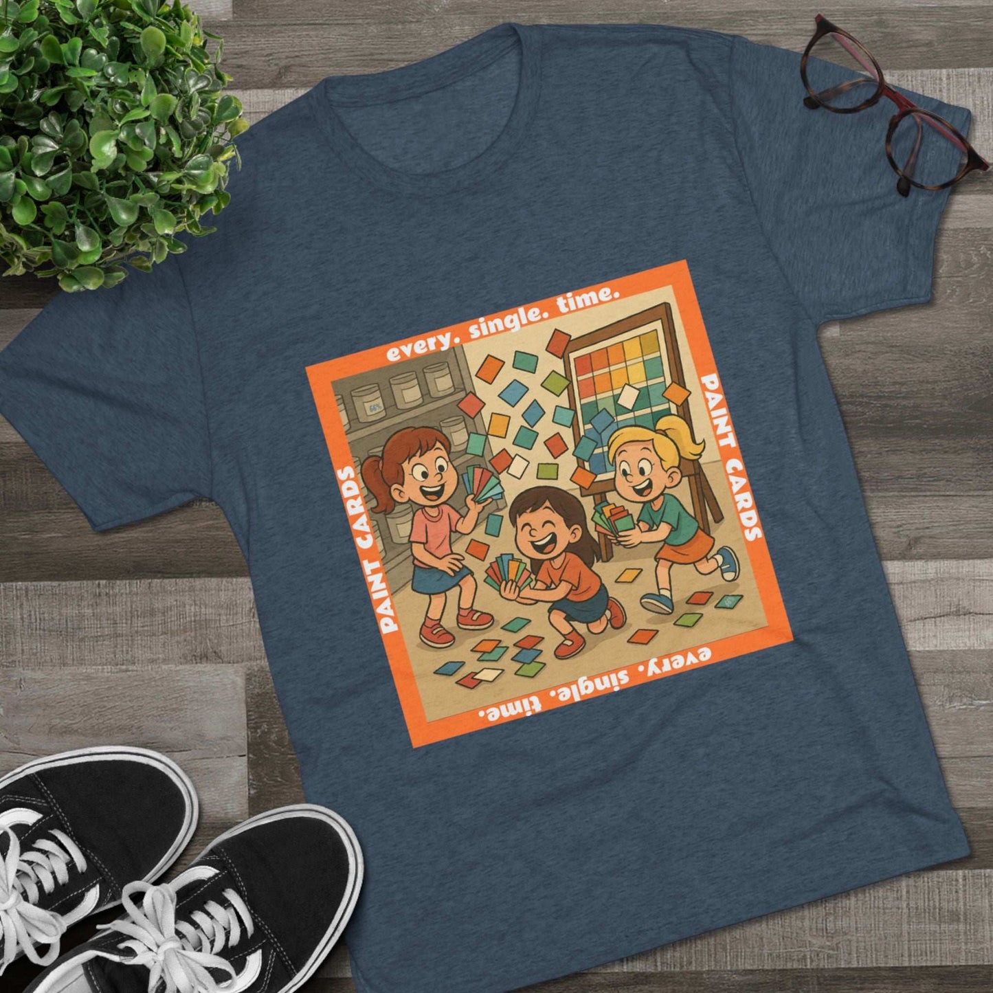 Paint Cards Every Single Time 66% Tri-Blend Tee — graphic t-shirt, flat-lay with cartoon kids and paint swatches, orange bordered square design, casual unisex style
