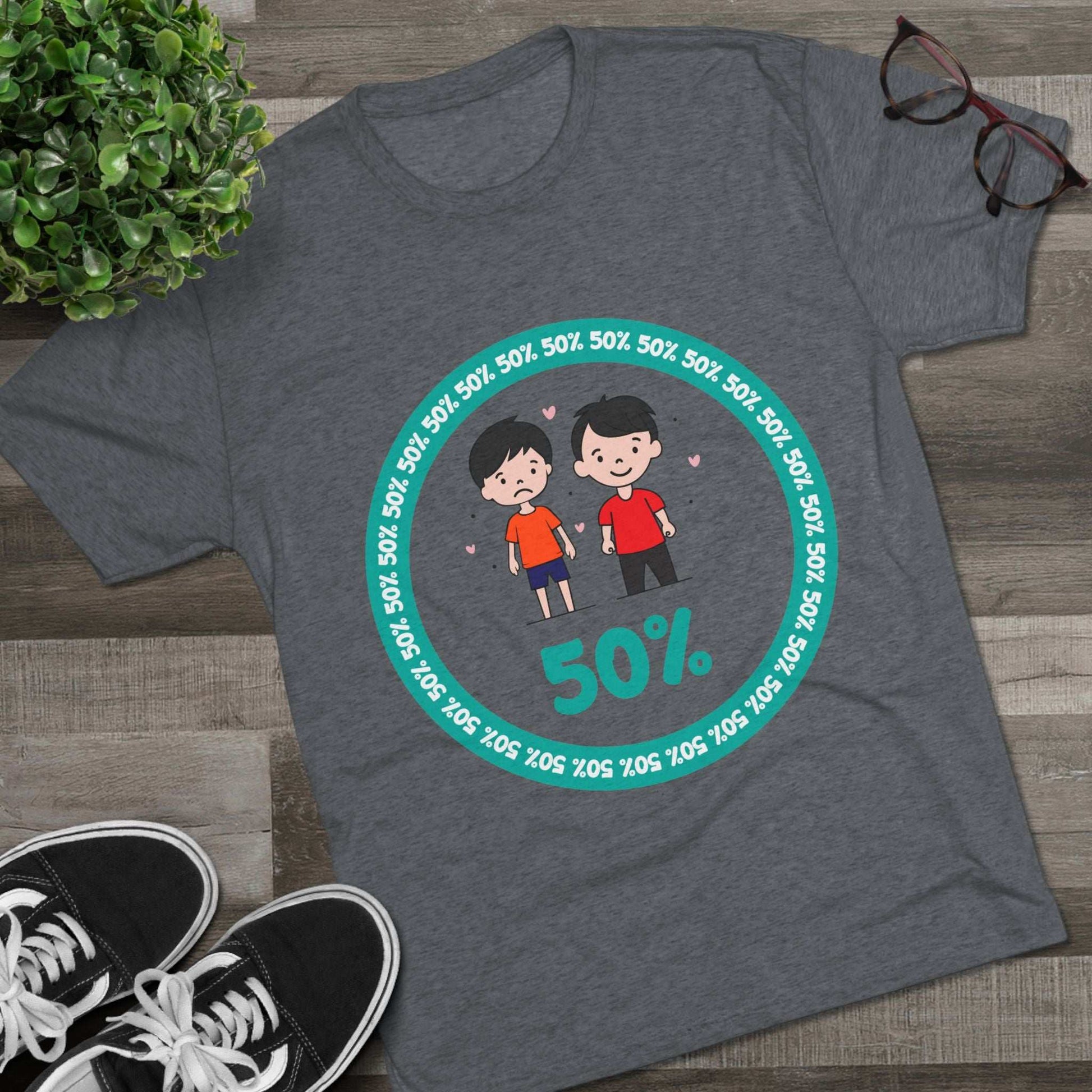 Original Boy Boy 50% Tri-Blend Tee — graphic t-shirt flat-lay, cartoon siblings inside teal 50% circle, repeating 50% pattern, bold 50% text, casual unisex style.