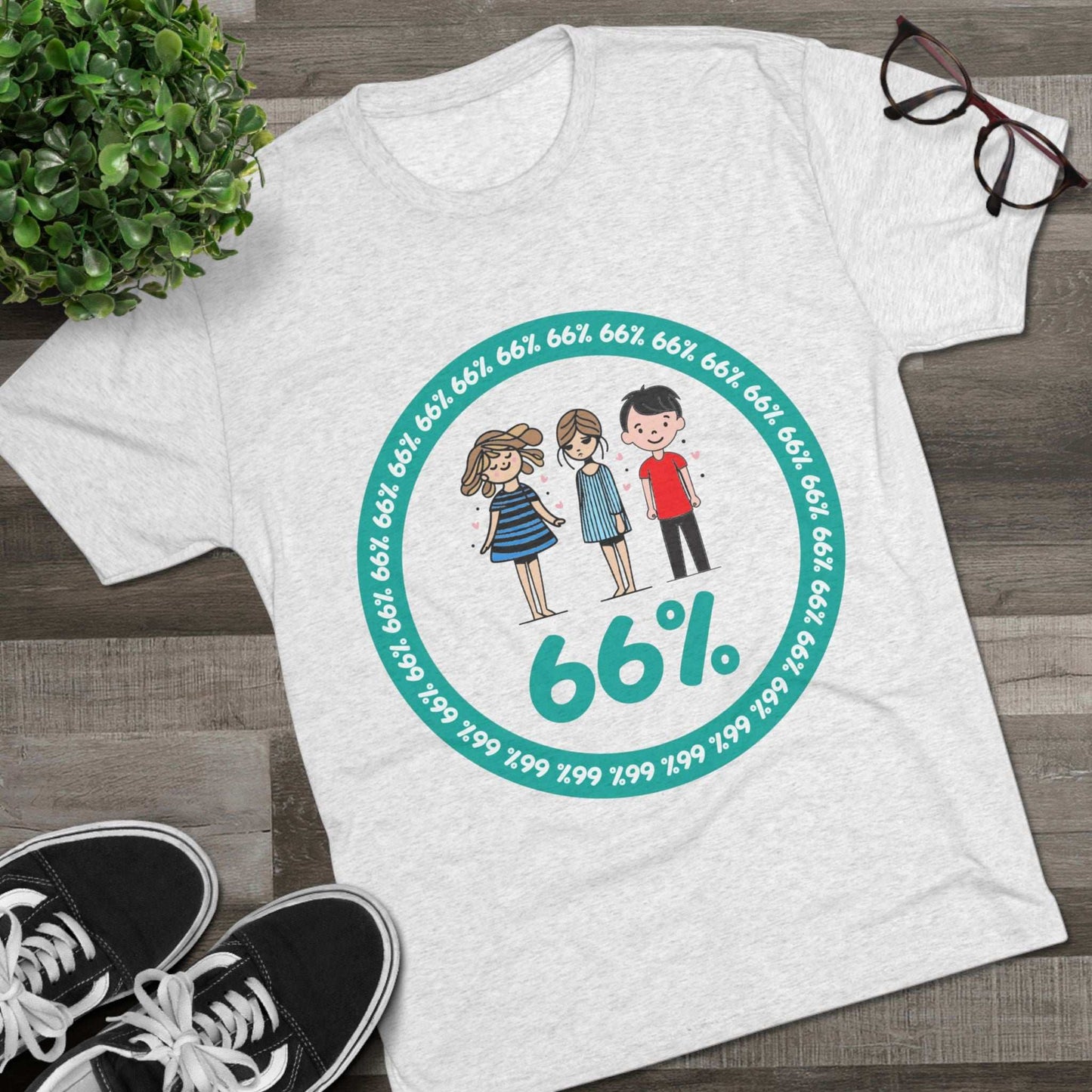 Flat-lay of tri-blend tee with two cartoon girls and one boy inside a teal 66% circle and repeating 66% border