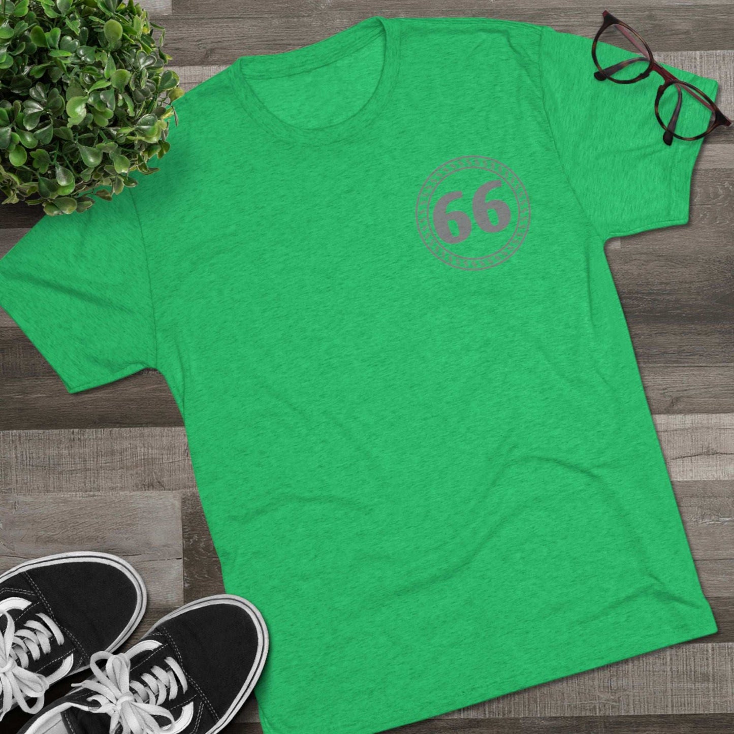 Retro 66% Tri-Blend Tee — flat-lay graphic t-shirt with circular 66 logo, heather blend, casual unisex style