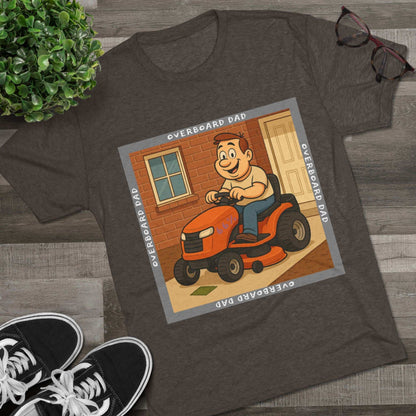 Overboard Dad Mower 66% Tri-Blend Tee — graphic tee, flat-lay with cartoon dad on ride-on mower, gray ‘OVERBOARD DAD’ square border, 66% decal, casual vintage style.