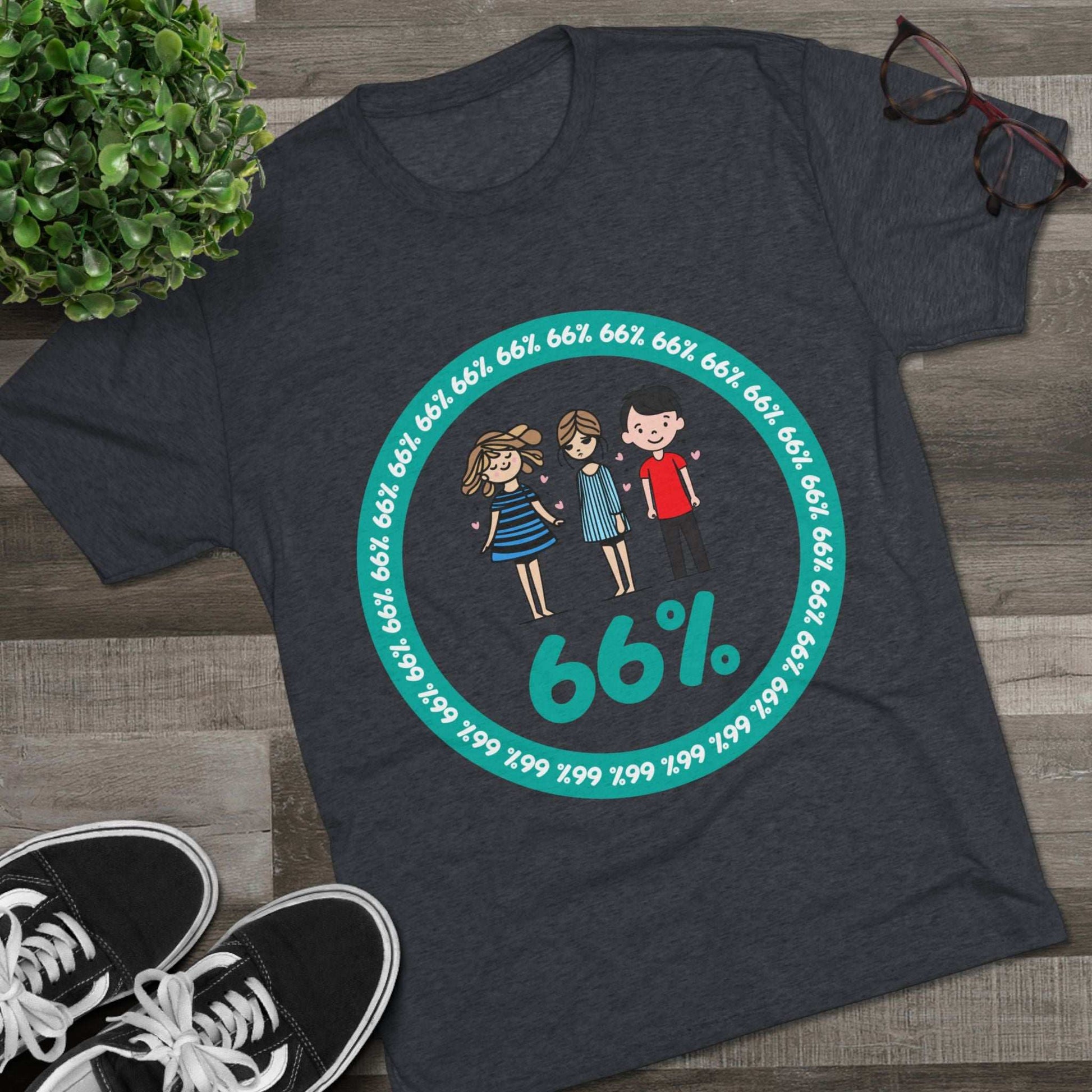Flat-lay of tri-blend tee with two cartoon girls and one boy inside a teal 66% circle and repeating 66% border