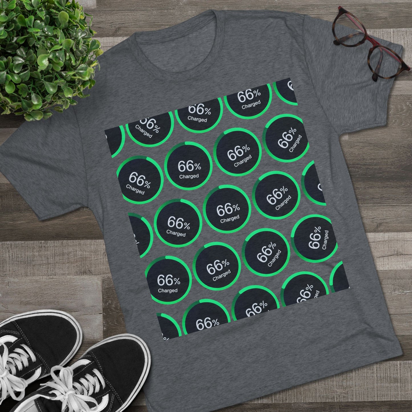 Retro 66% Charged Pattern Tee — tri-blend shirt, flat-lay battery gauge pattern, repeat “66% Charged” graphic, casual unisex style.