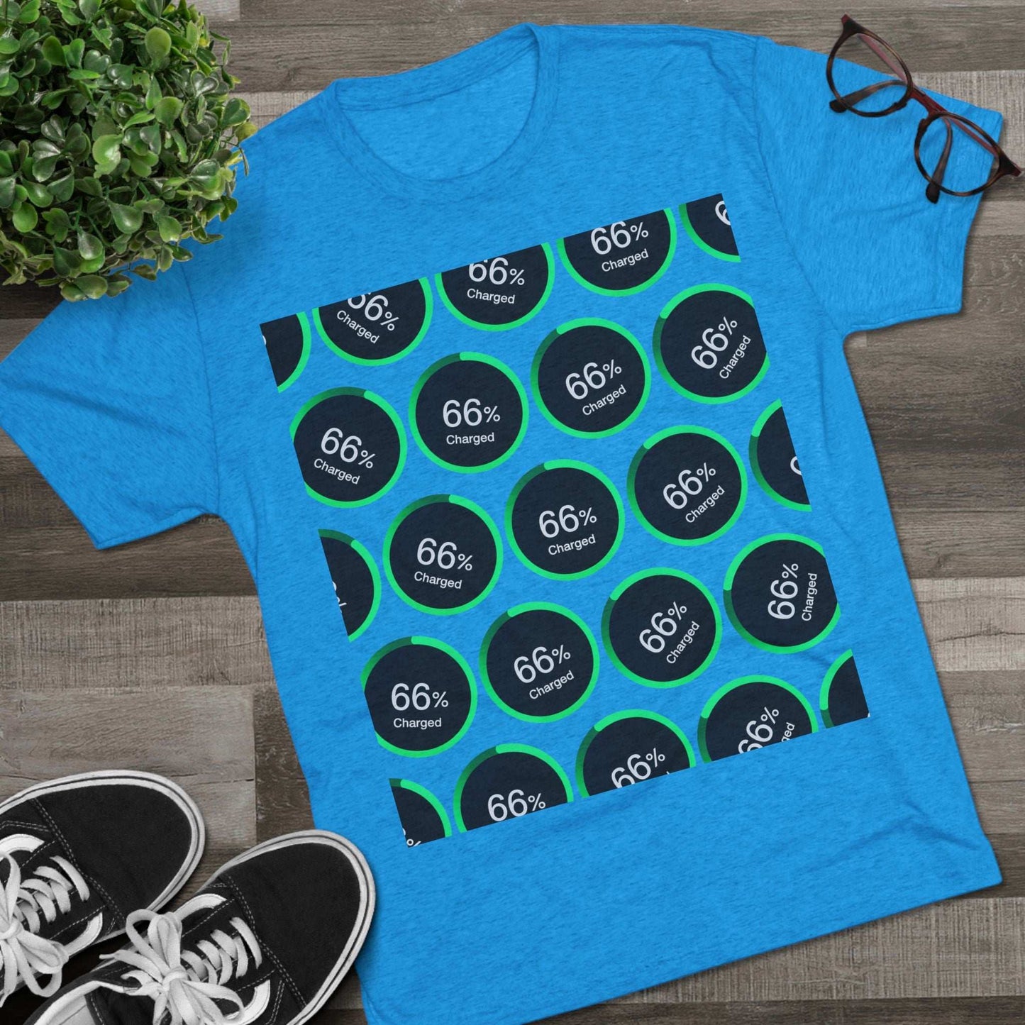 Retro 66% Charged Pattern Tee — tri-blend shirt, flat-lay battery gauge pattern, repeat “66% Charged” graphic, casual unisex style.