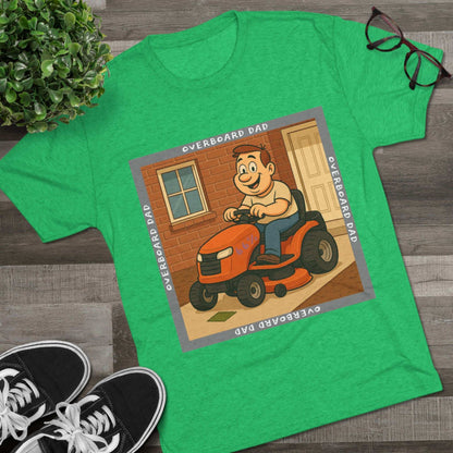 Overboard Dad Mower 66% Tri-Blend Tee — graphic tee, flat-lay with cartoon dad on ride-on mower, gray ‘OVERBOARD DAD’ square border, 66% decal, casual vintage style.