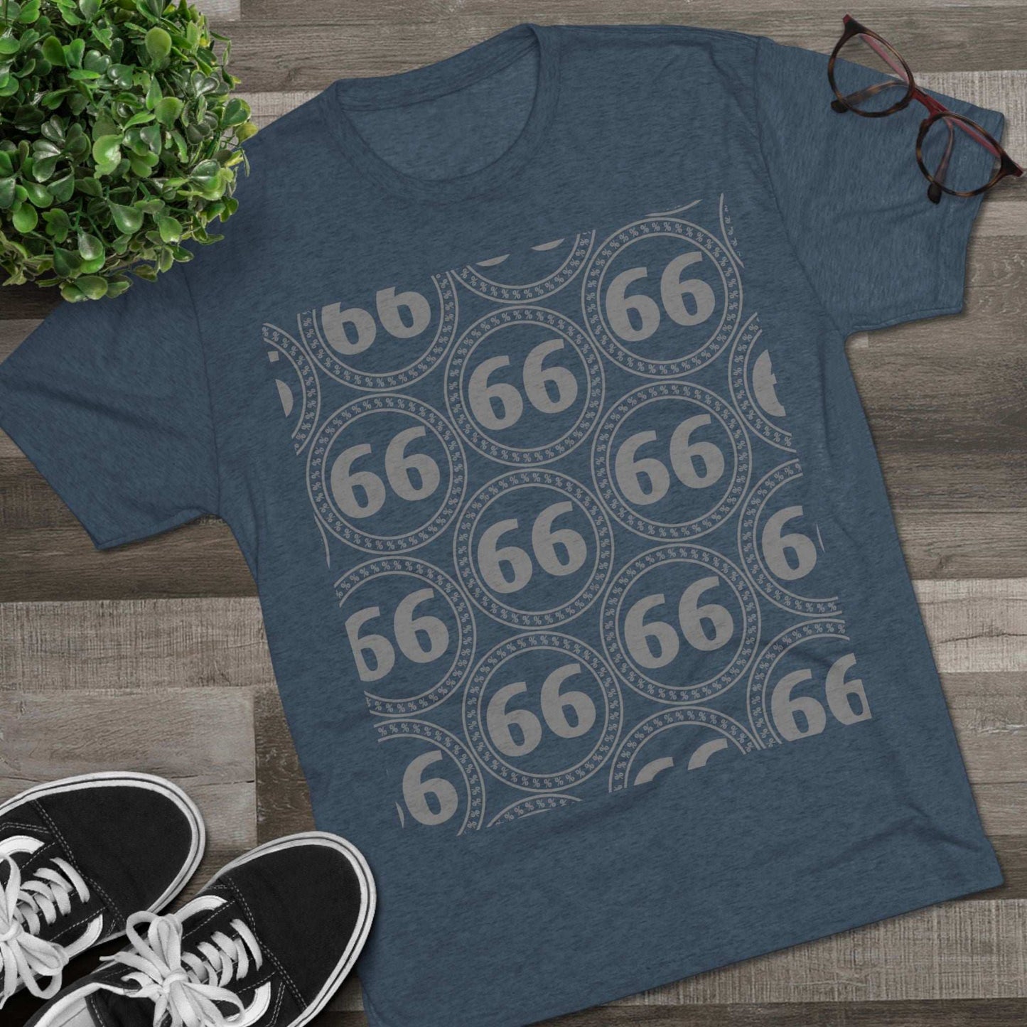 Retro 66% Pattern Tee— tri-blend graphic t-shirt flat-lay, repeating 66 circle pattern, casual vintage style.