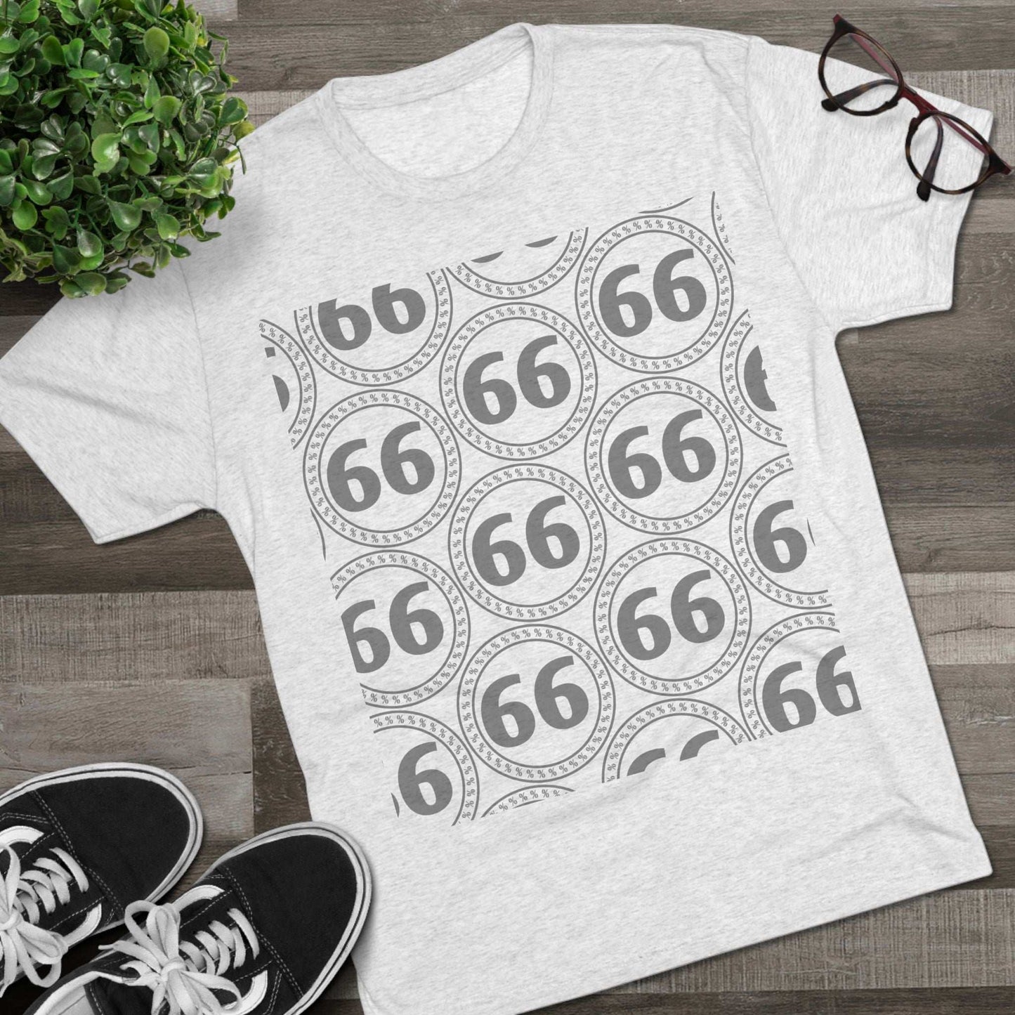 Retro 66% Pattern Tee— tri-blend graphic t-shirt flat-lay, repeating 66 circle pattern, casual vintage style.