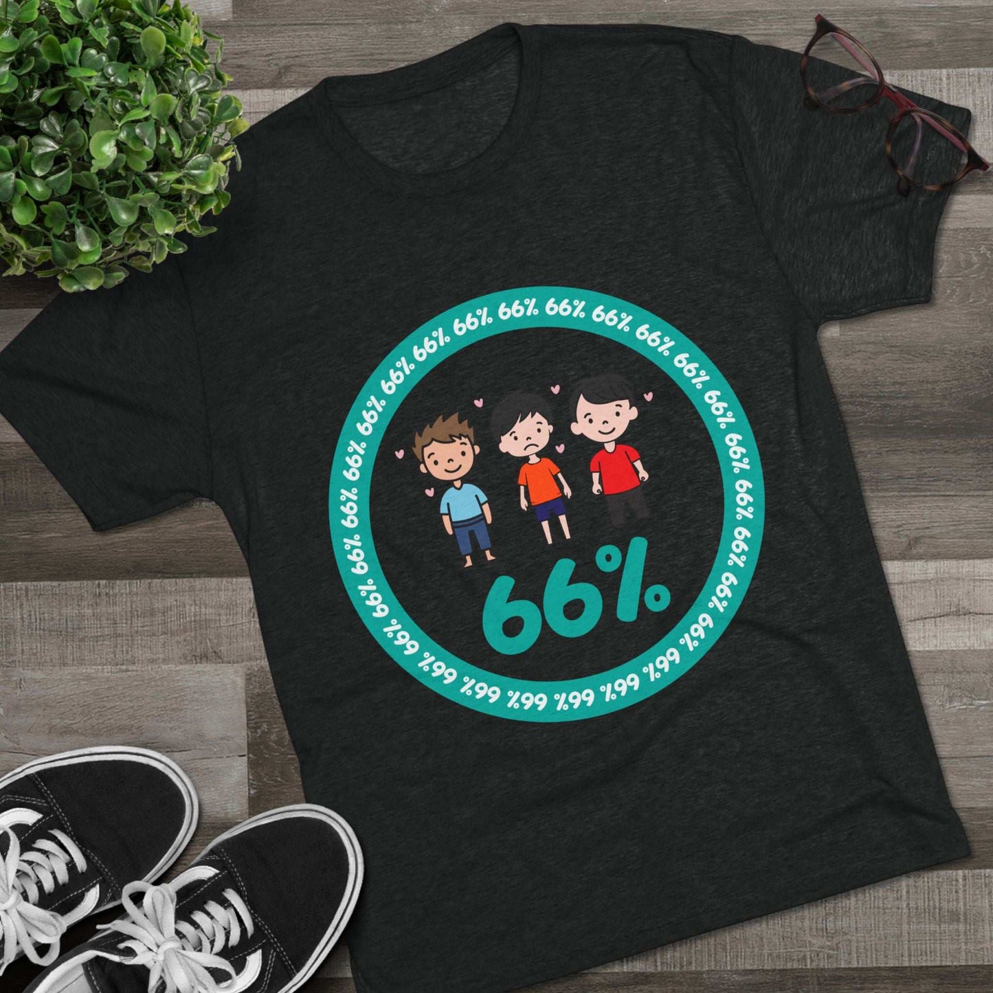 Flat-lay of tri-blend tee with three cartoon boys inside a teal 66% circle and repeating 66% border
