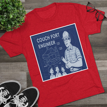 Couch Fort Engineer T-Shirt —Blueprint-style schematic of a couch fort with labeled pillows and blanket, plus a hard-hat dad holding plans.