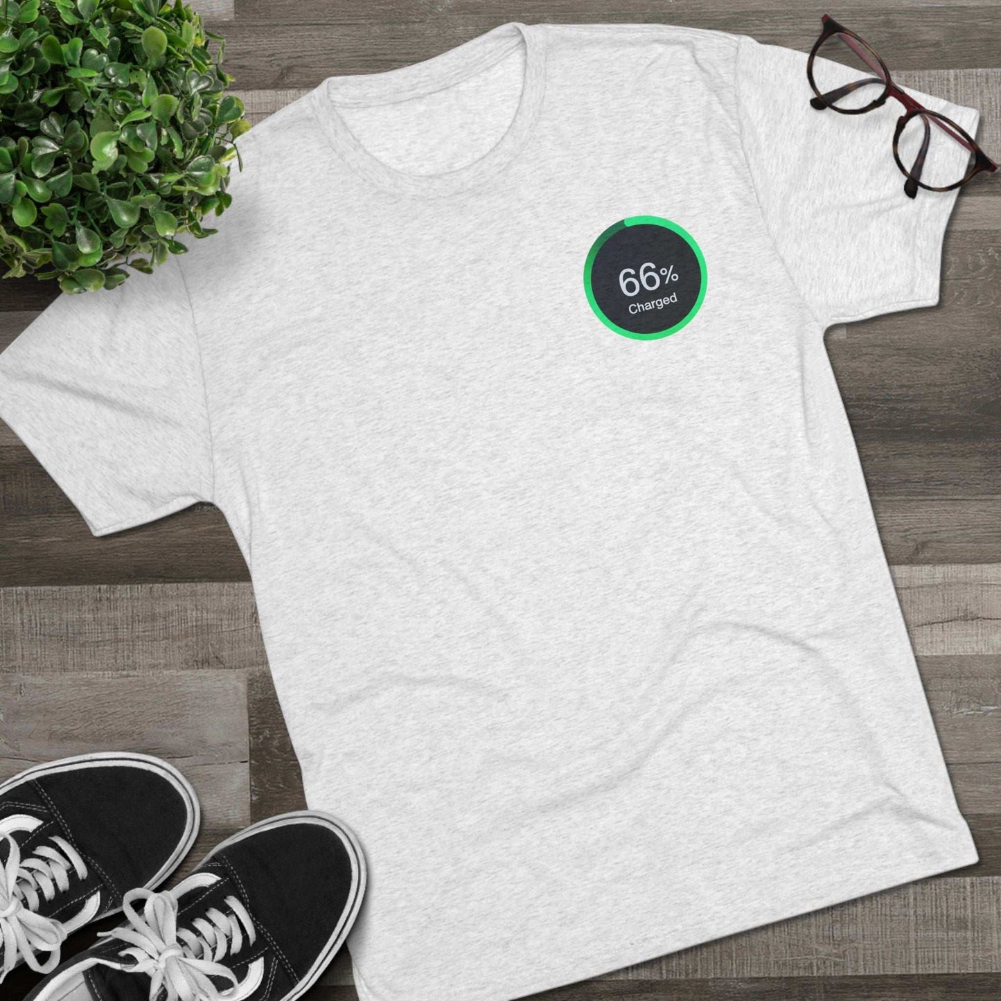 Retro 66% Charged Beach Dad Tri-Blend Tee (back view), featuring a humorous cartoon dad carrying beach gear enclosed in a bold circular ‘66%’ frame