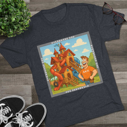 Funny cartoon dad standing proudly beside an enormous playhouse castle with slides, “Overboard Dad 66%” design on bright blue tri-blend t-shirt