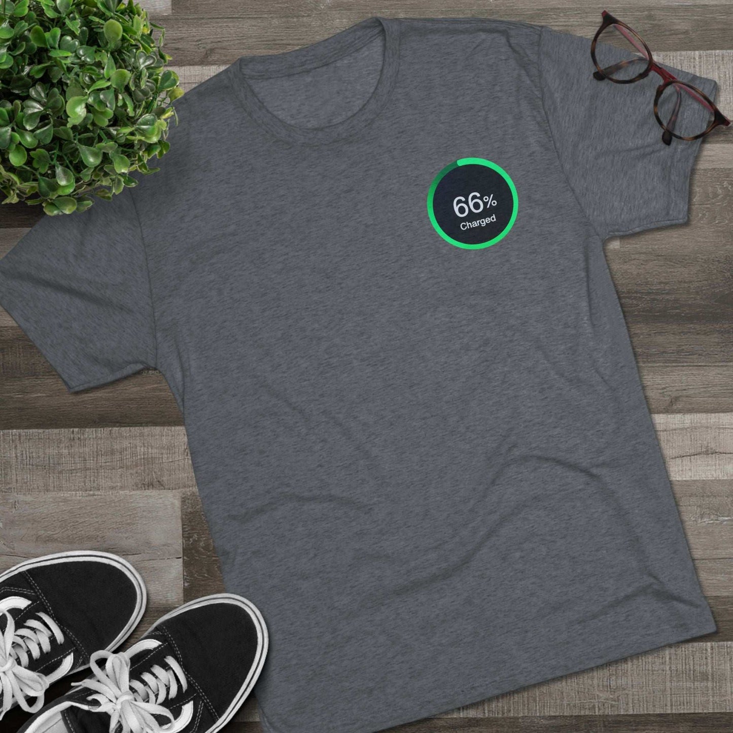 Retro 66% Charged Tri-Blend Tee, showing a vibrant green circular battery gauge reading “66% Charged”