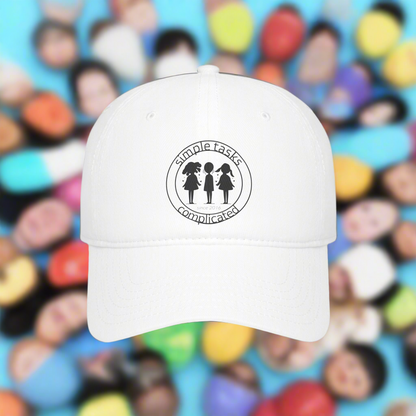 White cap with a logo on a colorful background